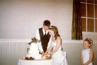 the first slice of wedding cake